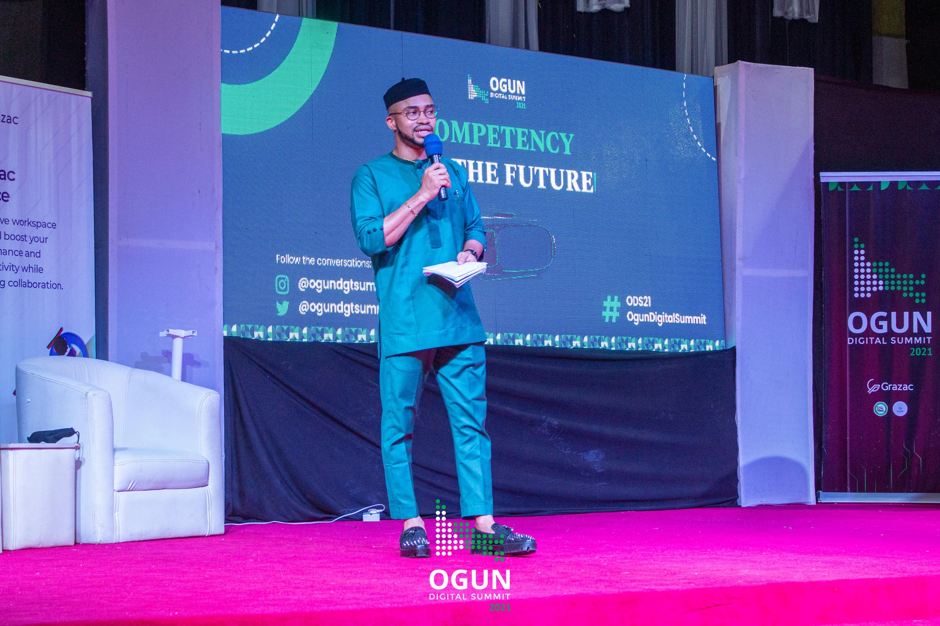 Ogun Digital Summit 2021 stage photograph showing the summit identity on the screen and surrounding event signage