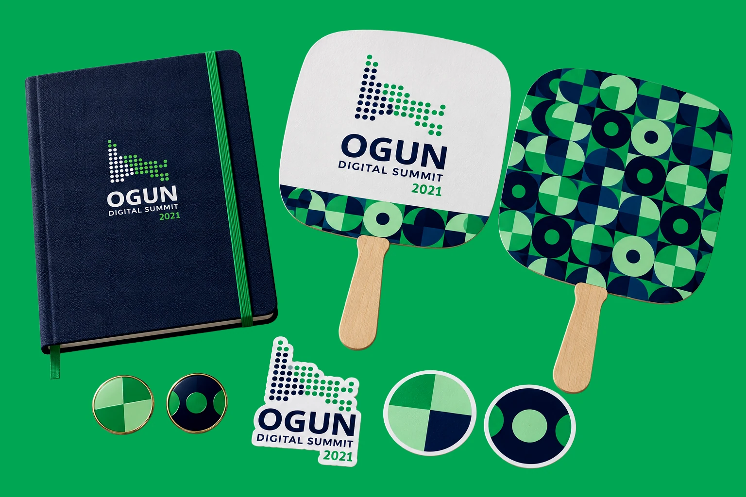Branded notebook, fans and small accessories with the Ogun Digital Summit logo and geometric green pattern